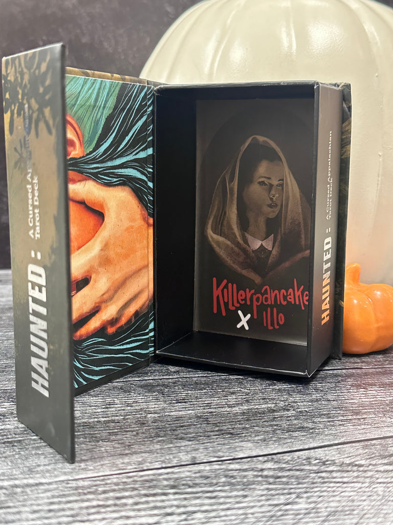 Inside of HAUNTED: A Cursed Appalachian Tarot Deck box with magnetic closure 